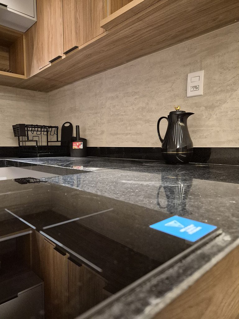 Apartment with balcony and fully equipped kitchen in the hea